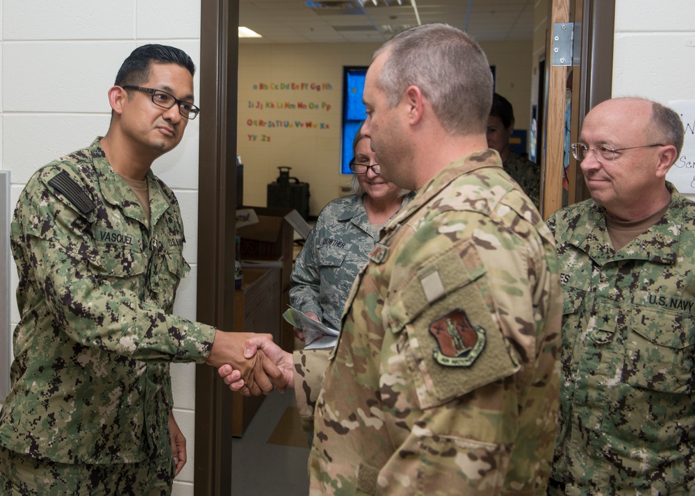103rd Airlift Wing Commander presents coin at East Central Georgia Innovative Readiness Training