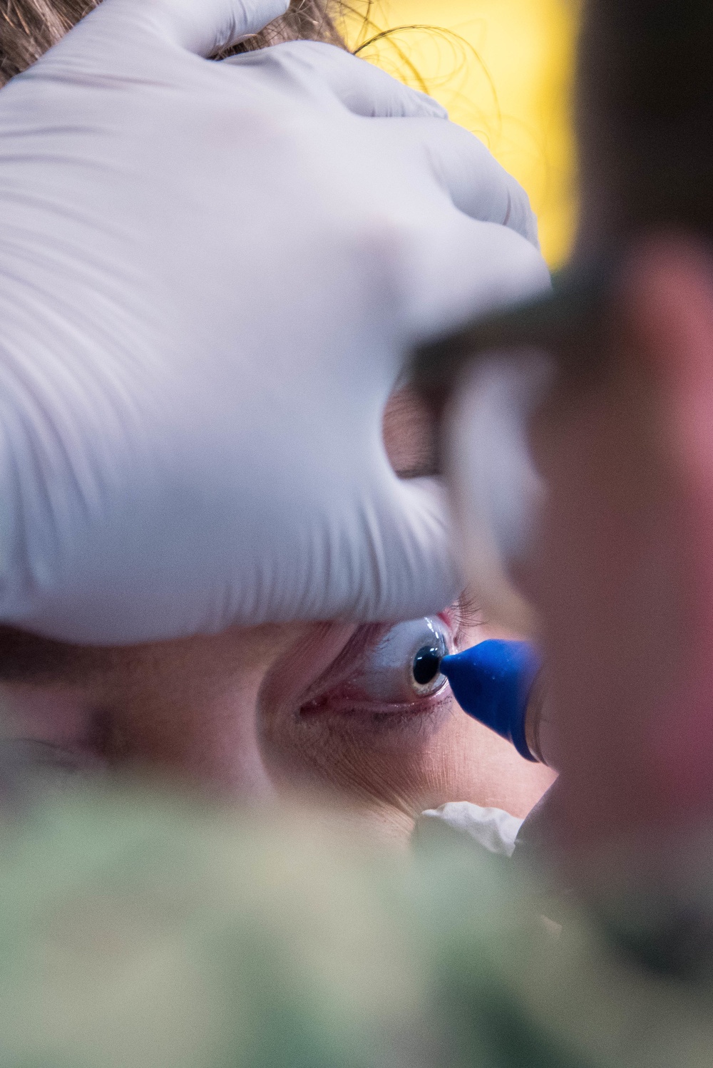 IRT Navy Corpsman Performs Ocular Exam