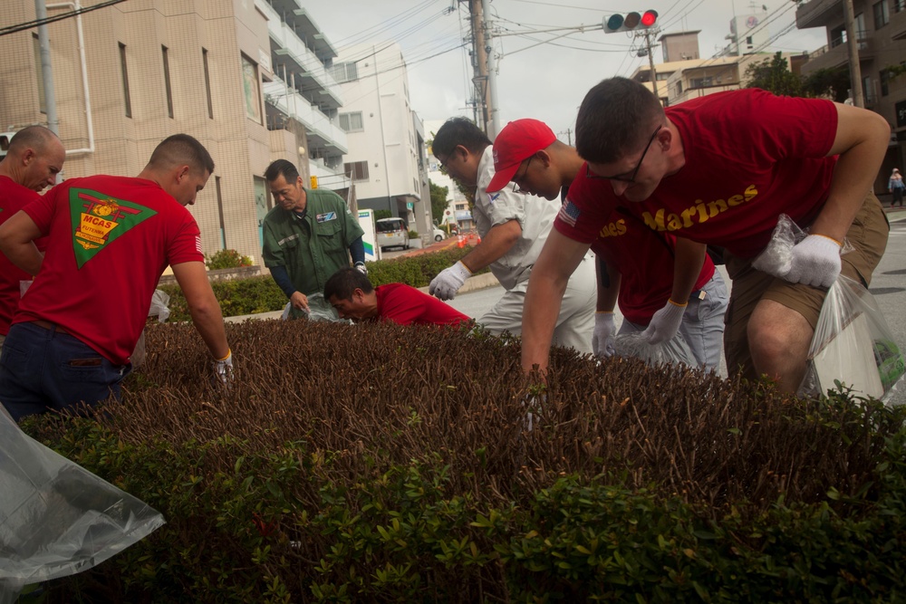Okinawan residents and U.S. Marines cleanup Ginowan