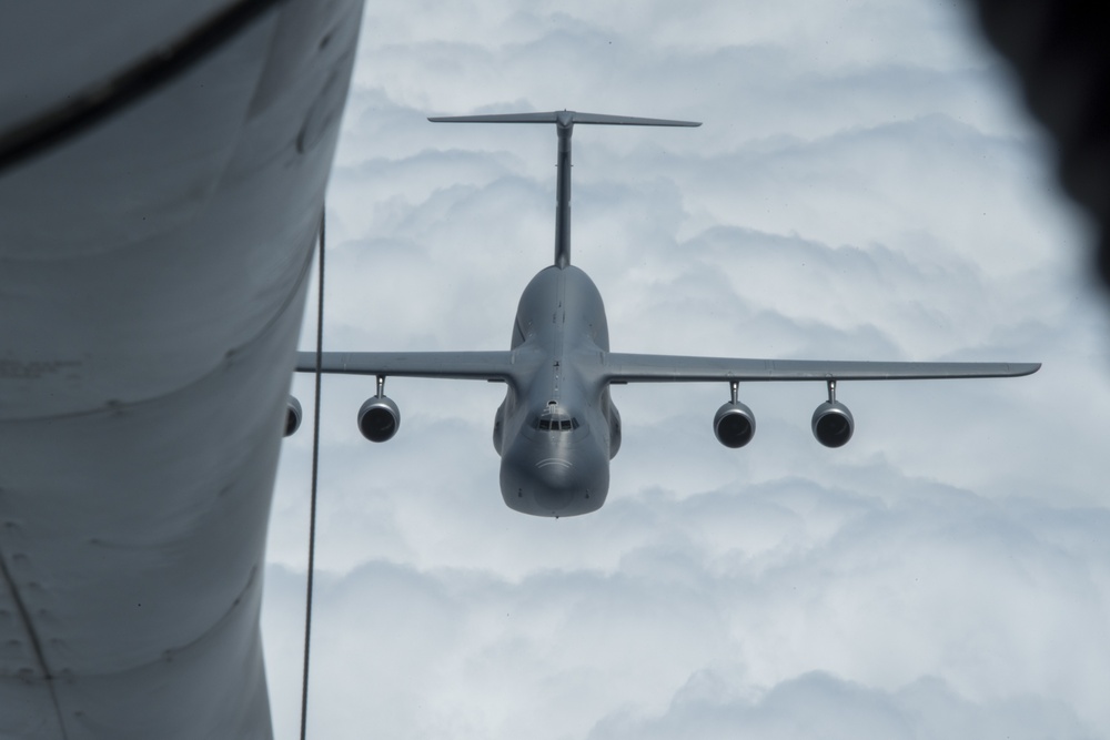 KC-135 Performs Aerial Refuel With C-5