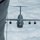 KC-135 Performs Aerial Refuel With C-5