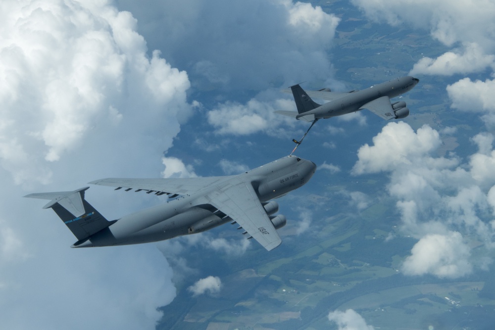 KC-135 Performs Aerial Refuel With C-5