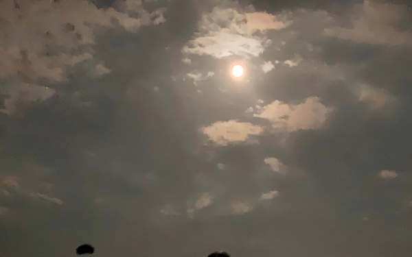 Full moon brings light to paratroopers jumping