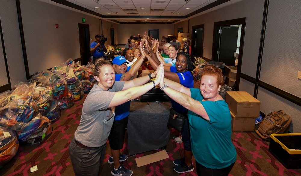 Family Support Leads Pack Swag Bags for Families