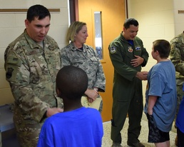 New York Air National Guard Airmen from the 106th Rescue Wing honored at a local school for Flag Day