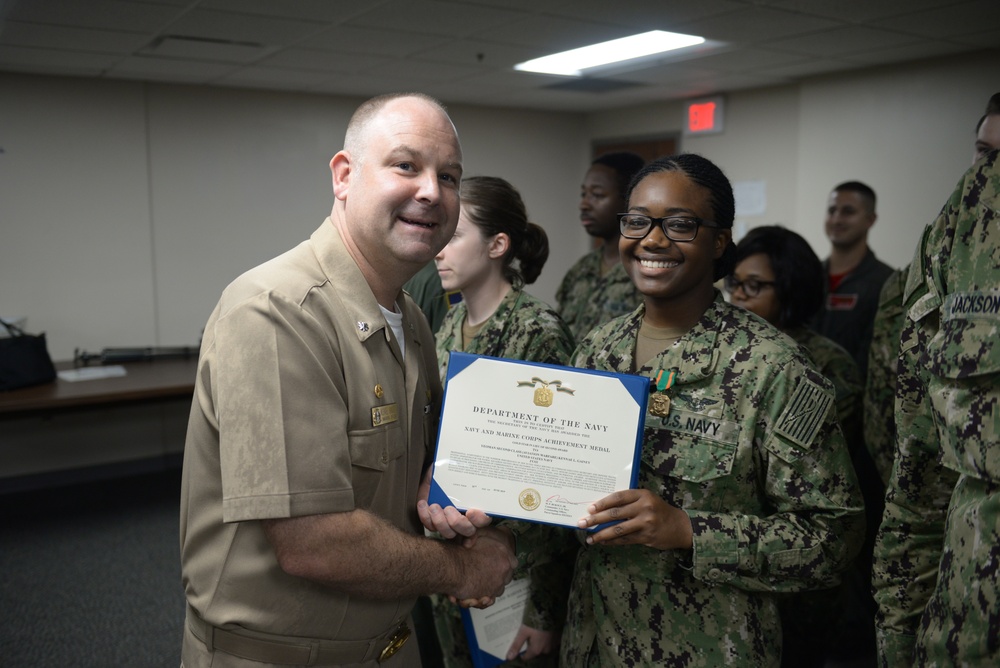 Awards Quarters for deserving Sailors