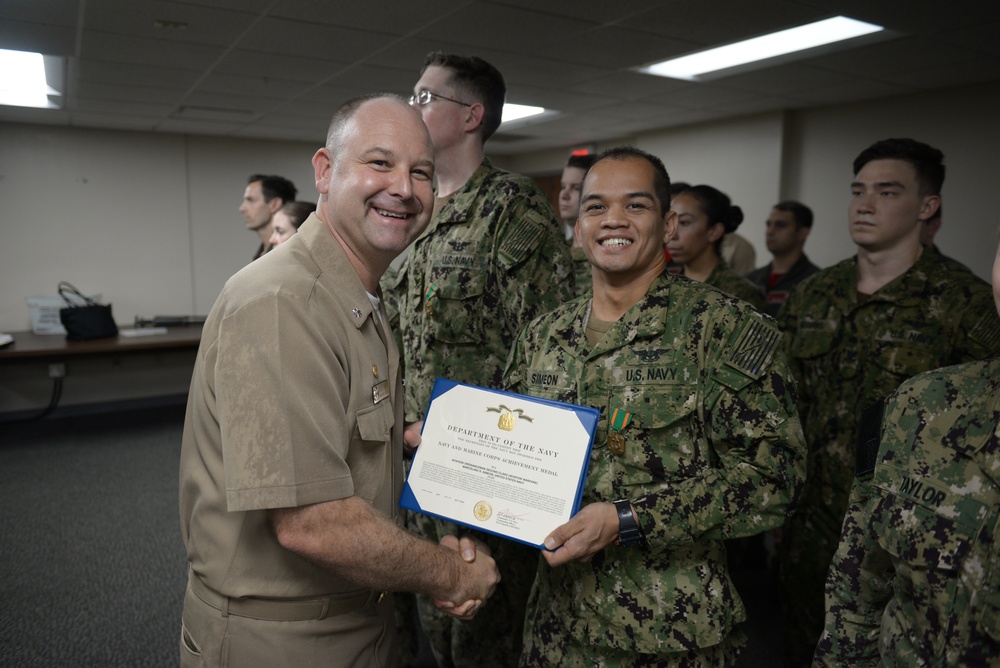 Awards Quarters for deserving Sailors