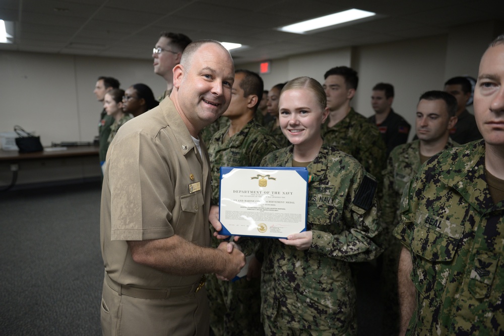 Awards Quarters for deserving Sailors