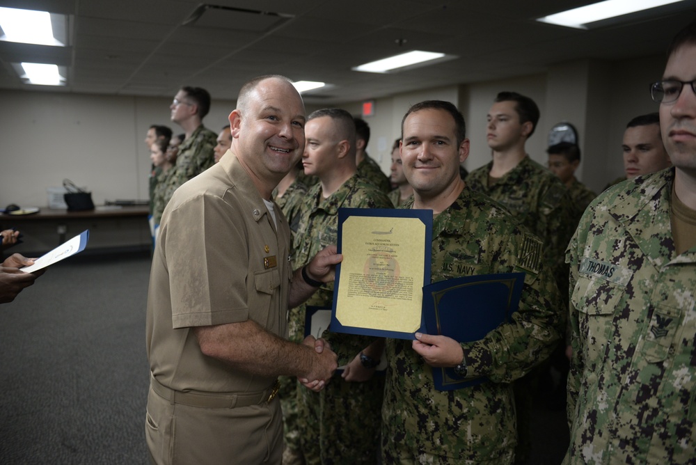 Awards Quarters for deserving Sailors