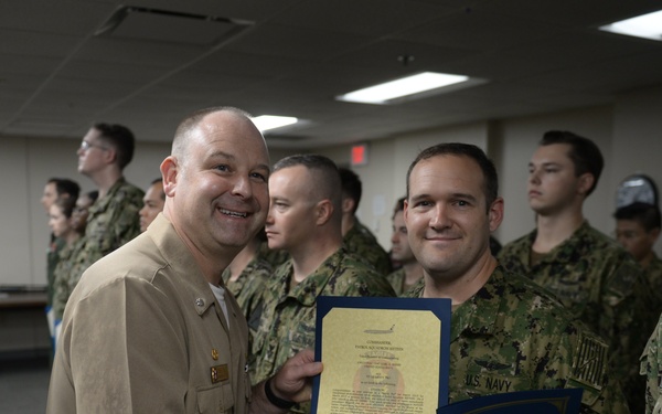 Awards Quarters for deserving Sailors