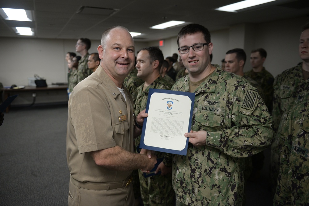 Awards Quarters for deserving Sailors