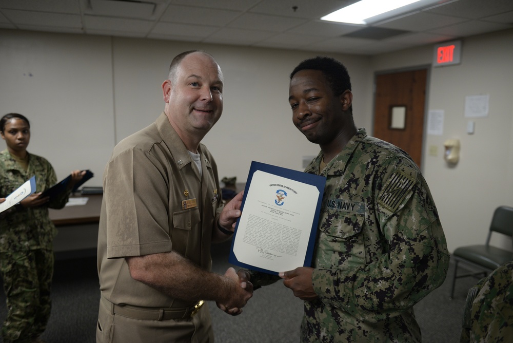 Awards Quarters for deserving Sailors