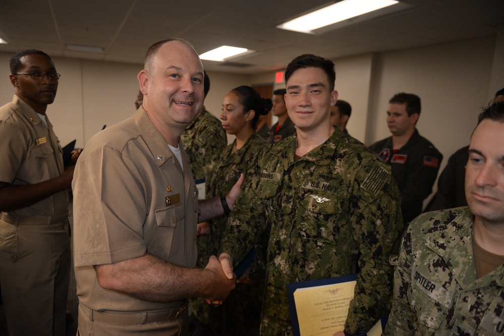 Awards Quarters for deserving Sailors