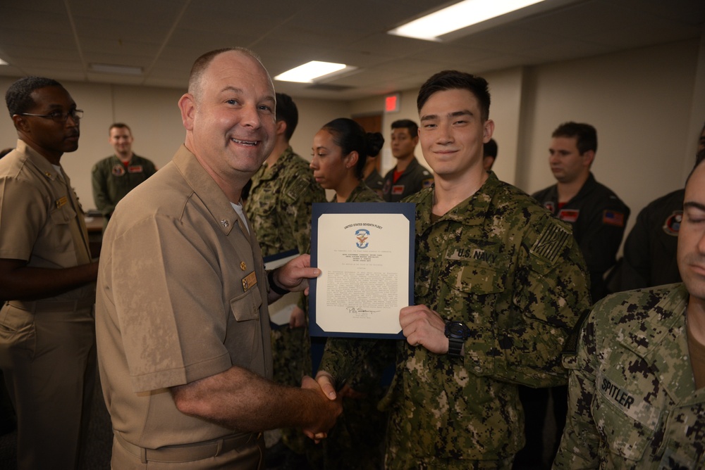 Awards Quarters for deserving Sailors