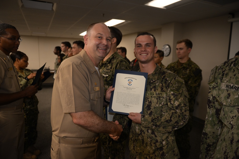 Awards Quarters for deserving Sailors