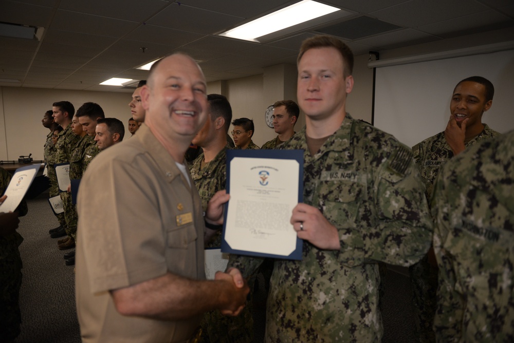 Awards Quarters for deserving Sailors