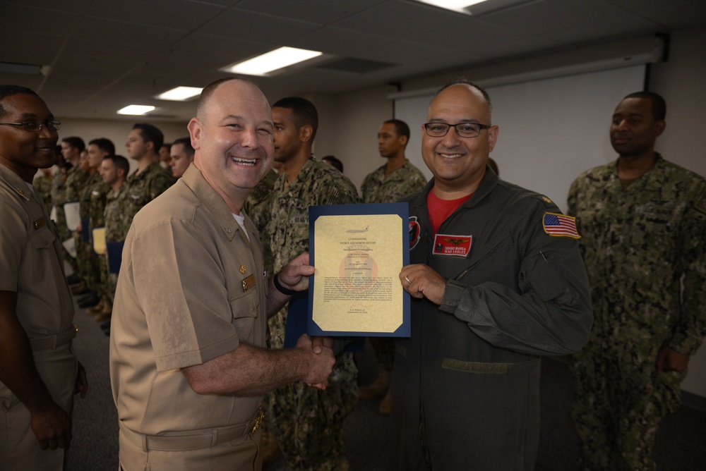 Awards Quarters for deserving Sailors