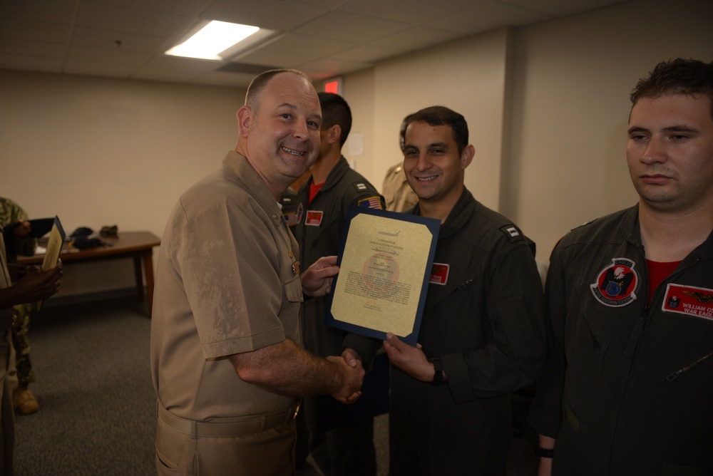 Awards Quarters for deserving Sailors