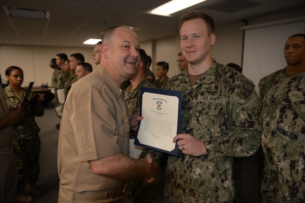 Awards Quarters for deserving Sailors