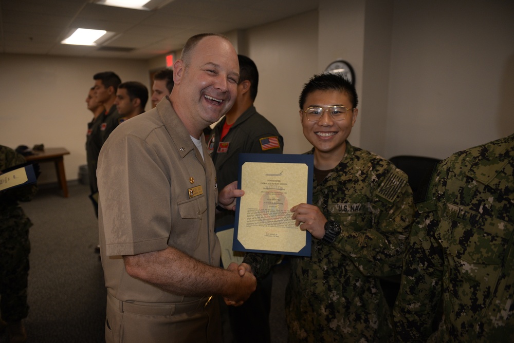 Awards Quarters for deserving Sailors