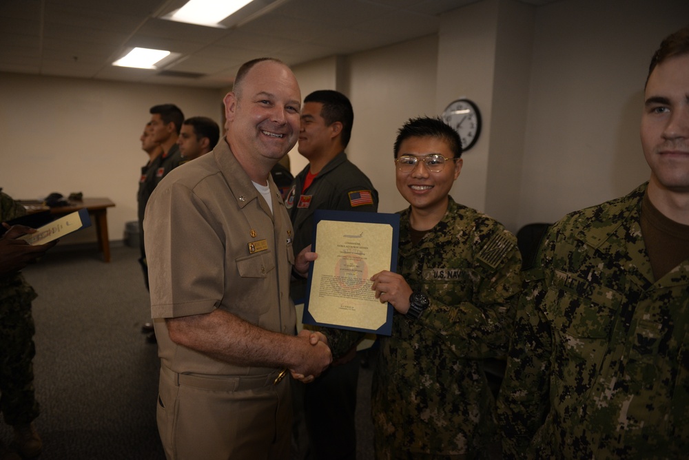 Awards Quarters for deserving Sailors