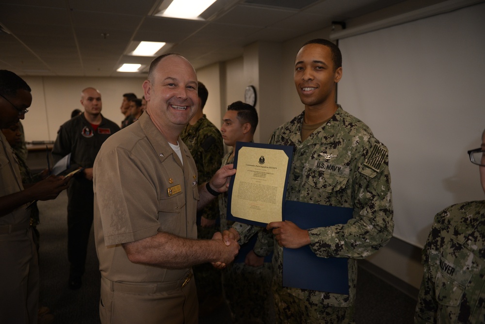 Awards Quarters for deserving Sailors