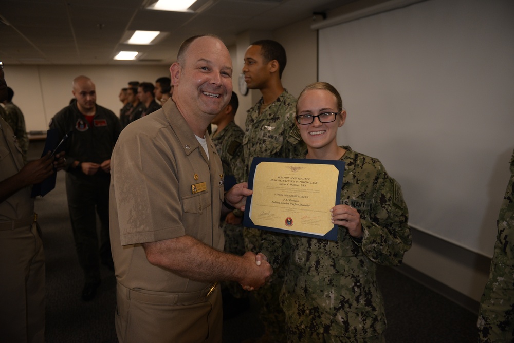 Awards Quarters for deserving Sailors