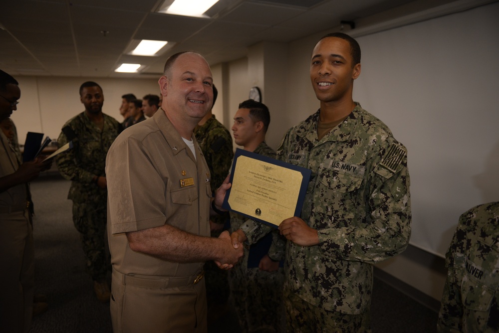 Awards Quarters for deserving Sailors