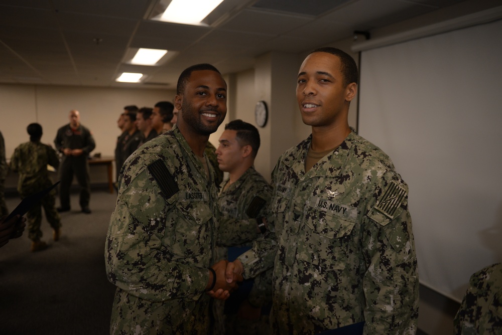 Awards Quarters for deserving Sailors