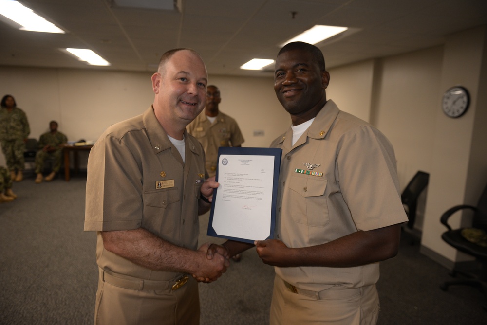 Awards Quarters for deserving Sailors