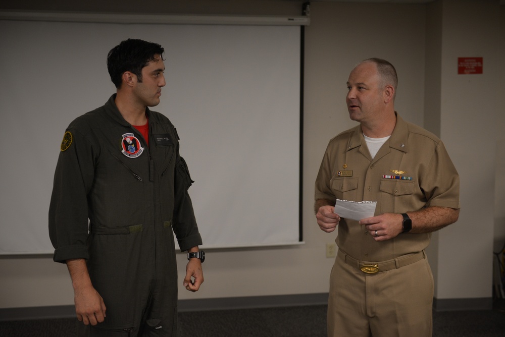 Awards Quarters for deserving Sailors