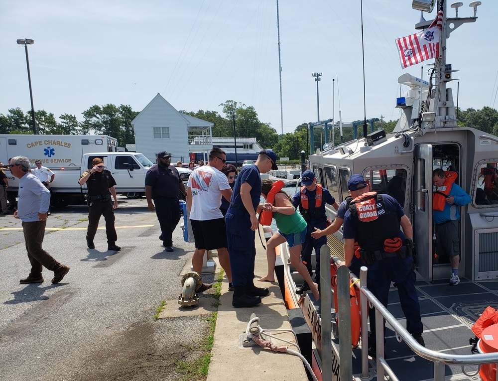 Coast Guard rescues 5 people from capsized boat in Chesapeake Bay