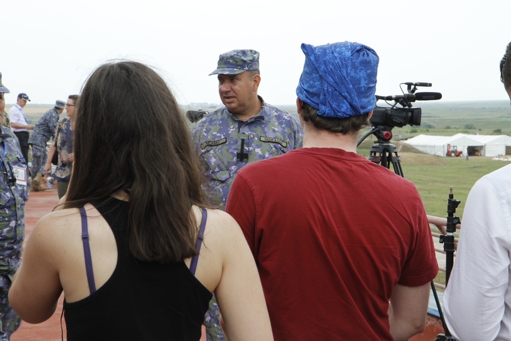 Col. Neamu of the Romanian Air Force explains Distinguished Visitors Day schedule