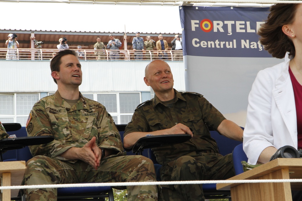 NATO's distinguished visitors watch missiles fire during live fire display