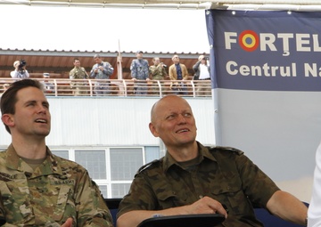 NATO's distinguished visitors watch missiles fire during live fire display