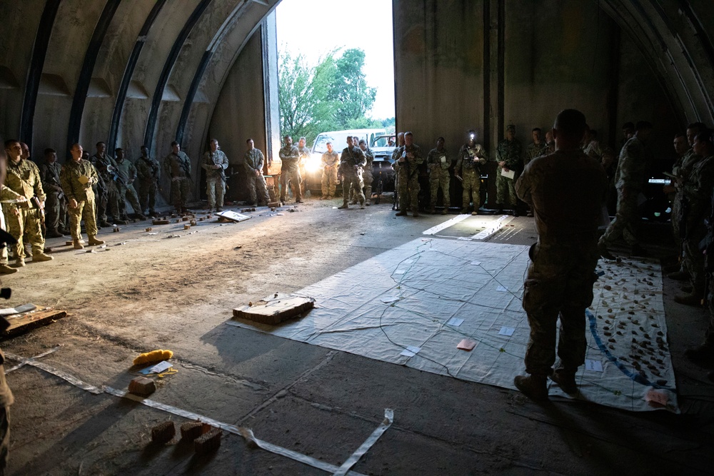 82nd Airborne Division paratroopers prepare for an airborne assault in Bulgaria