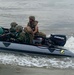 Romanian Soldiers maneuver a raft across the Danube River