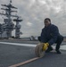 Nimitz Sailor Restows Fire Hose