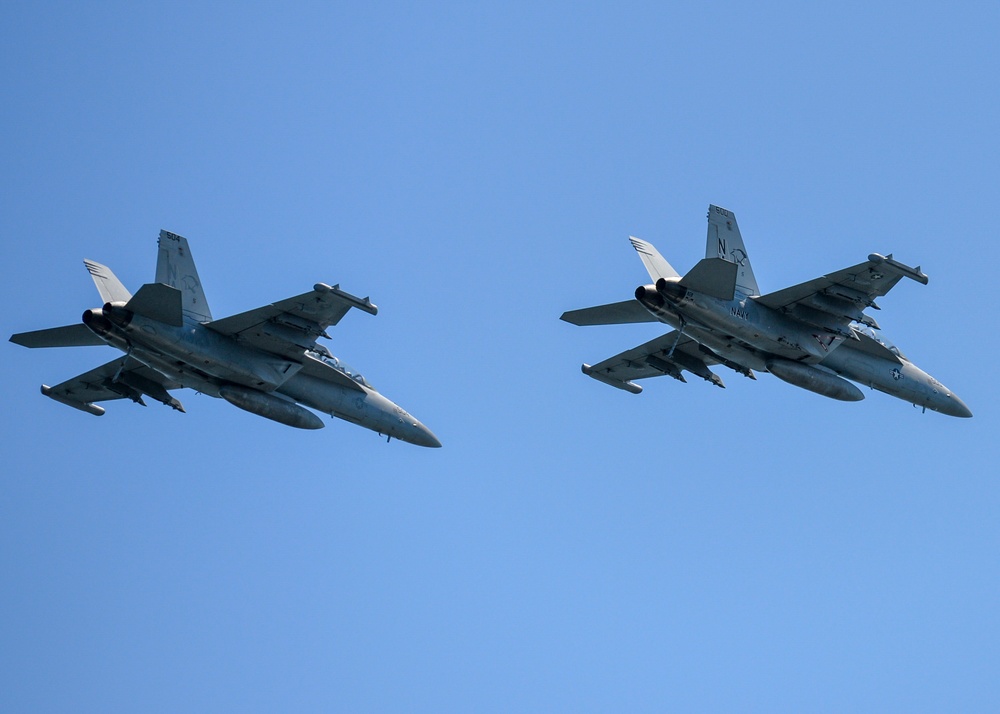 E/A-18 Growlers Fly Overhead Nimitz