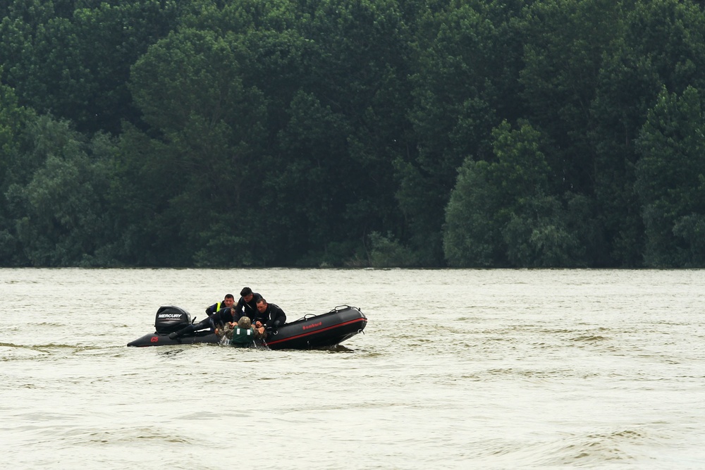 Romanian divers rescue service member during exercise Saber Guardian 19