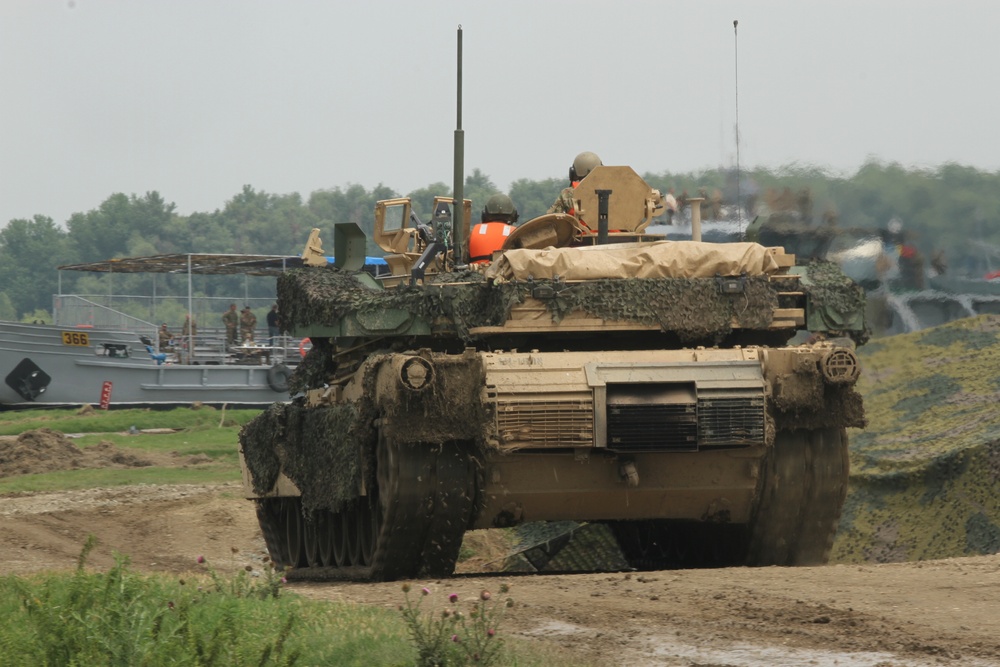 M1 Abrams advances down a path during Saber Guardian 19