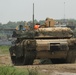 M1 Abrams advances down a path during Saber Guardian 19