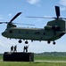 Soldiers attach raft section to Chinook