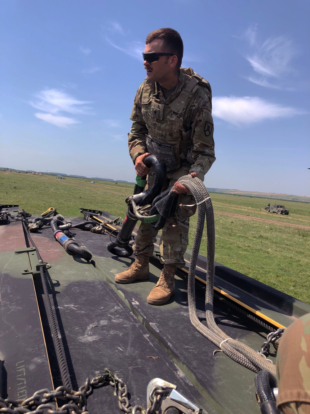Soldier prepares sling load
