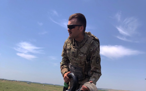 Soldier prepares sling load