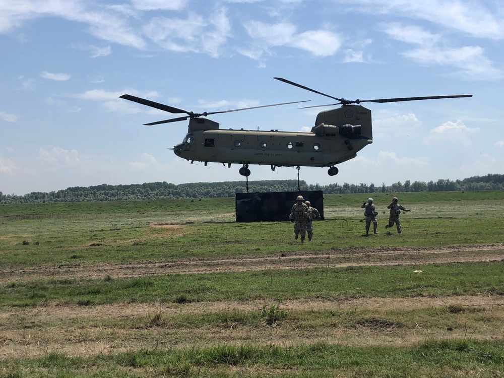 Soldiers work with aviation for sling load operations