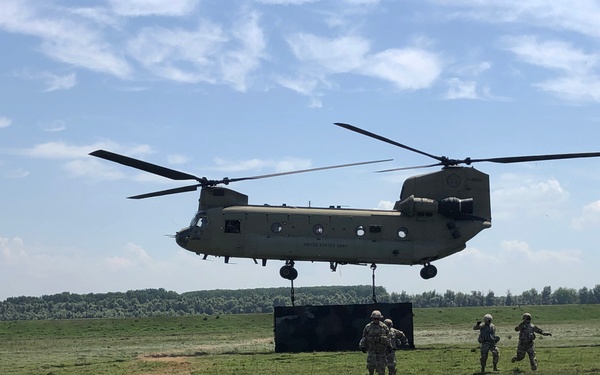 Soldiers work with aviation for sling load operations