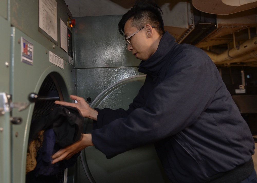 Nimitz Sailor Does Laundry