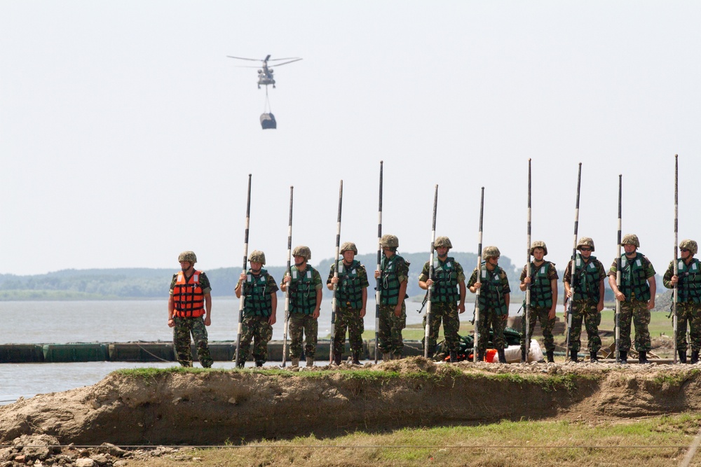 Engineers from the Romanian Land Forces Prepare to Test Bridge