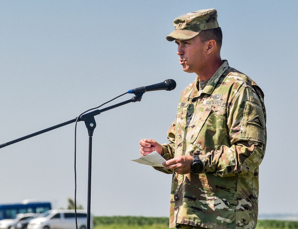 Brig. Gen. Christopher Norrie gives a closing ceremony speech